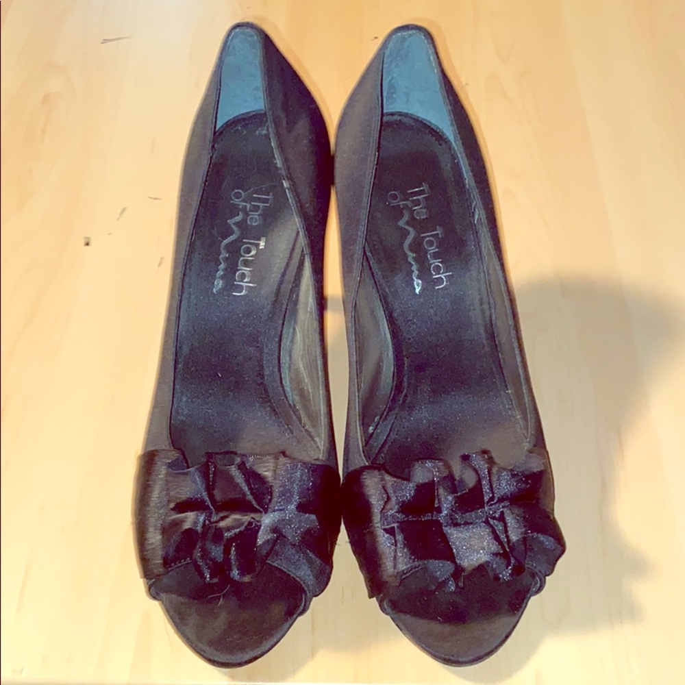 Black ruffled heels. Size 7.5